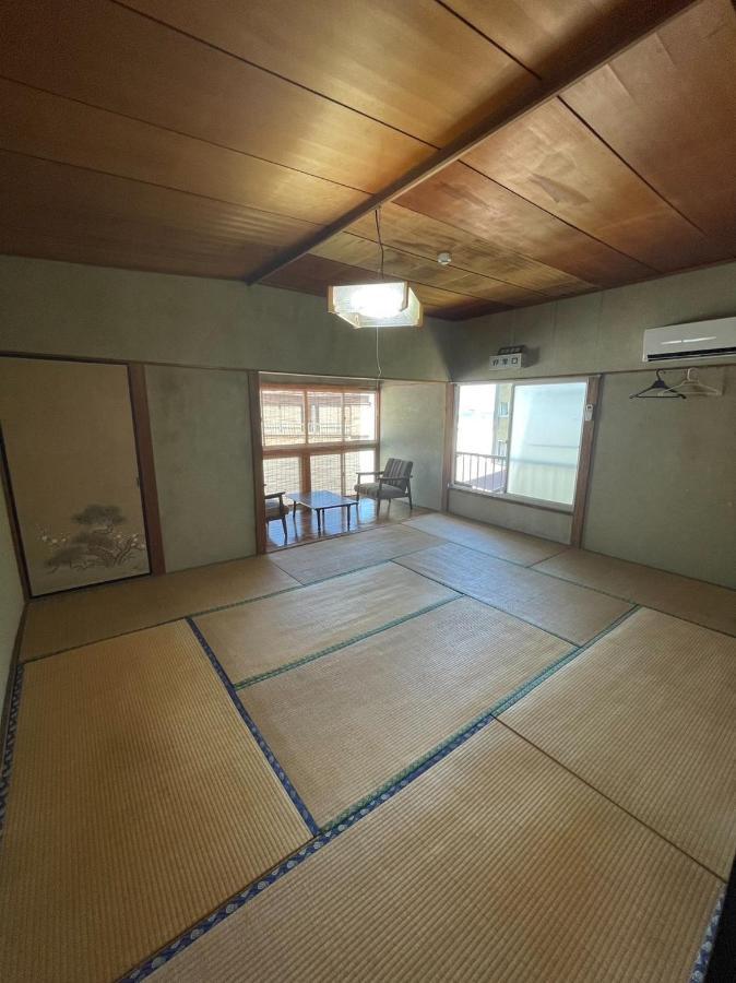 素泊まり民宿とみや Oshima Extérieur photo