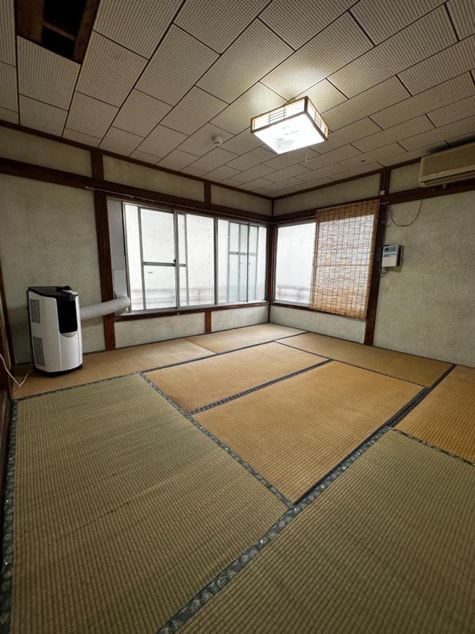 素泊まり民宿とみや Oshima Extérieur photo