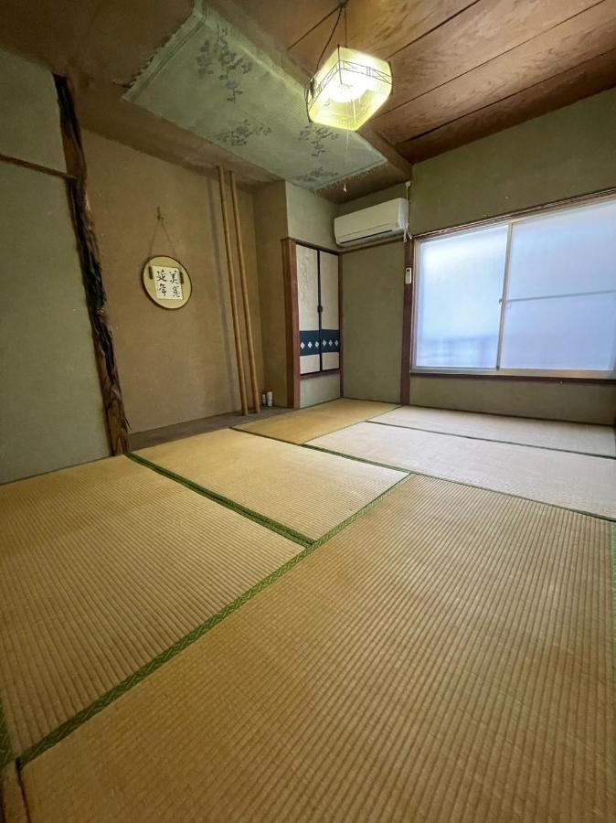 素泊まり民宿とみや Oshima Extérieur photo