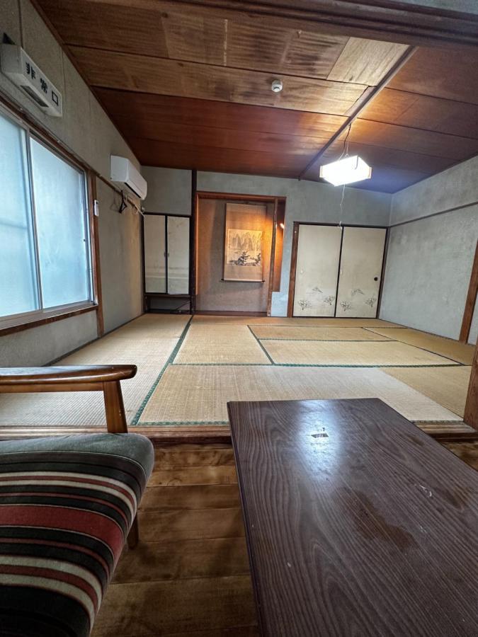素泊まり民宿とみや Oshima Extérieur photo