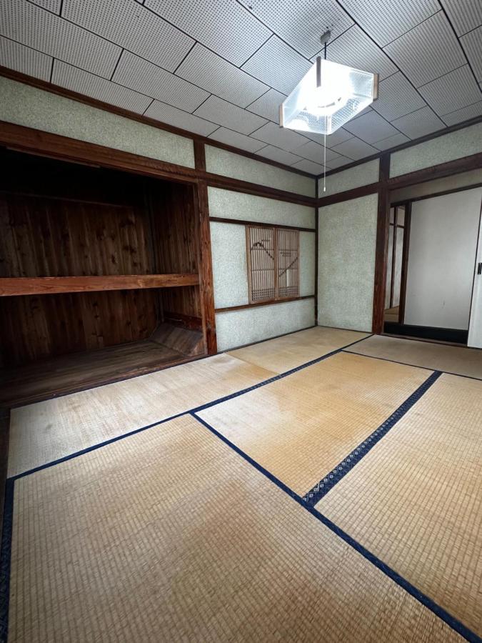 素泊まり民宿とみや Oshima Extérieur photo