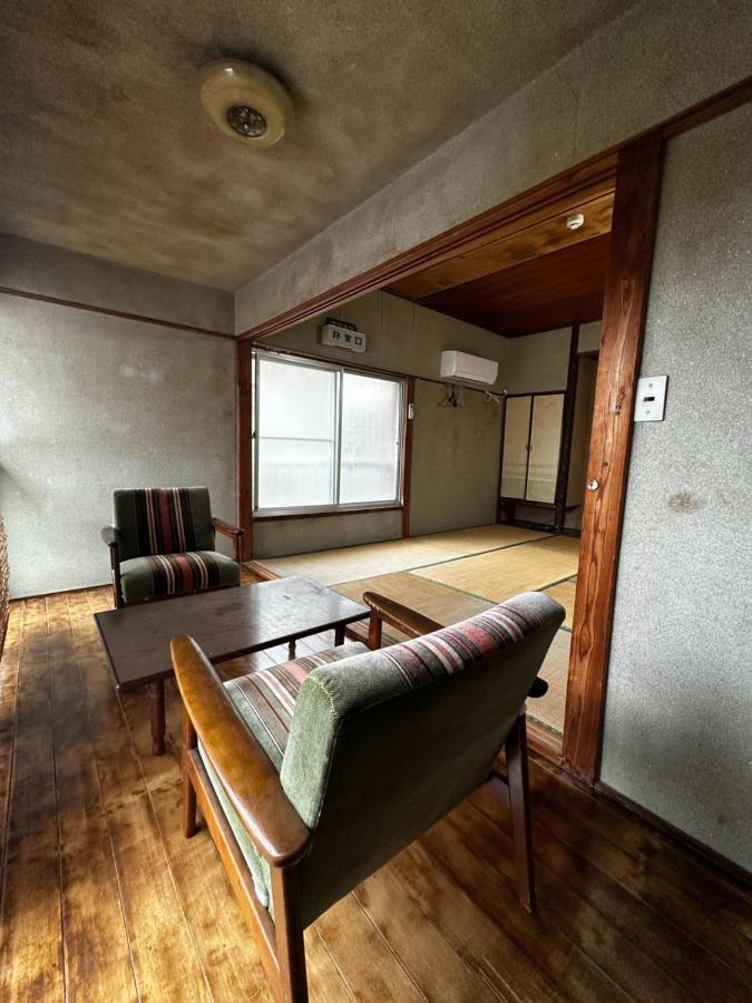 素泊まり民宿とみや Oshima Extérieur photo