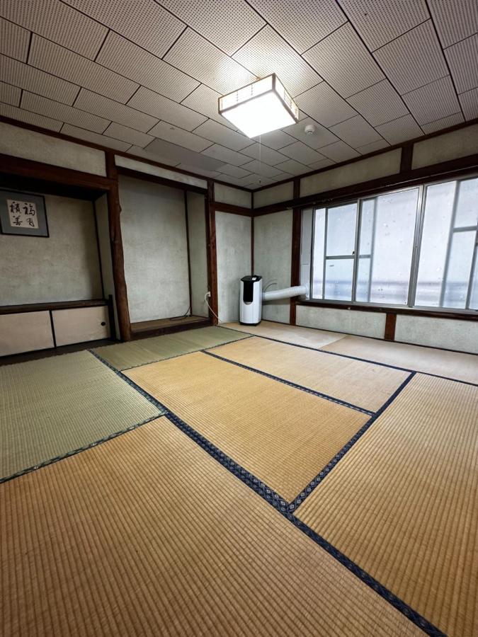 素泊まり民宿とみや Oshima Extérieur photo