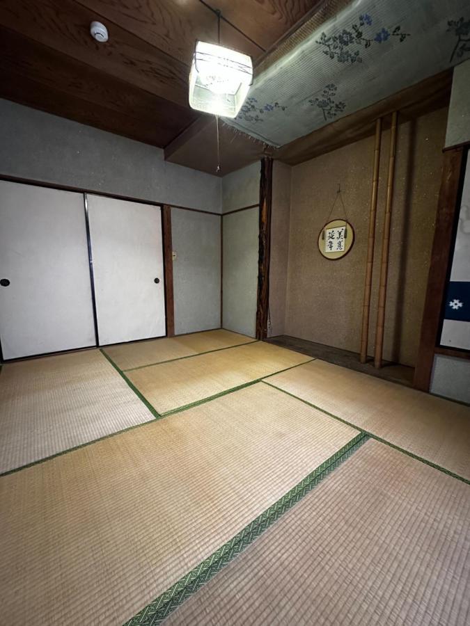 素泊まり民宿とみや Oshima Extérieur photo