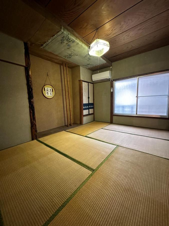 素泊まり民宿とみや Oshima Extérieur photo