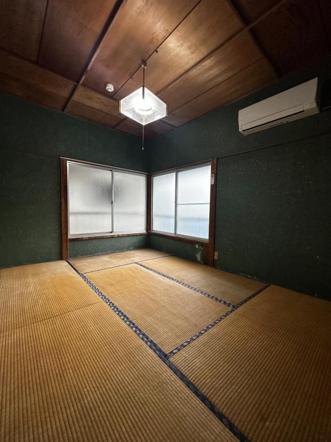 素泊まり民宿とみや Oshima Extérieur photo