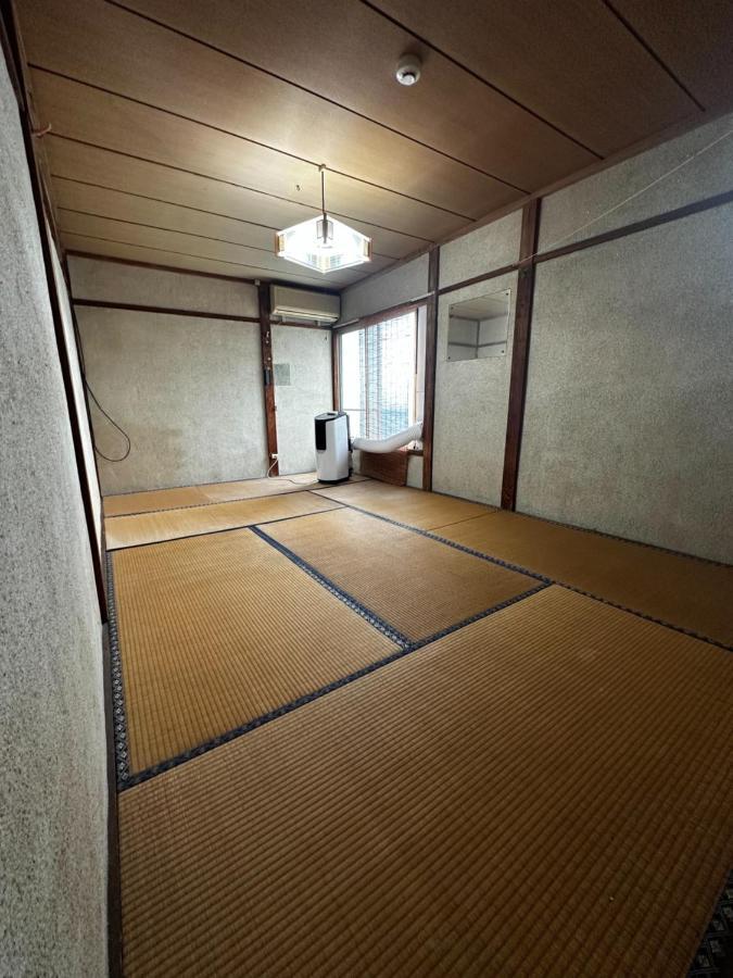 素泊まり民宿とみや Oshima Extérieur photo