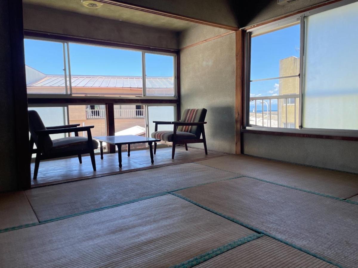 素泊まり民宿とみや Oshima Extérieur photo