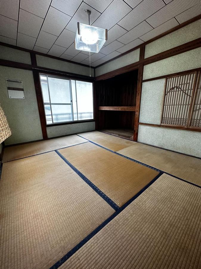 素泊まり民宿とみや Oshima Extérieur photo