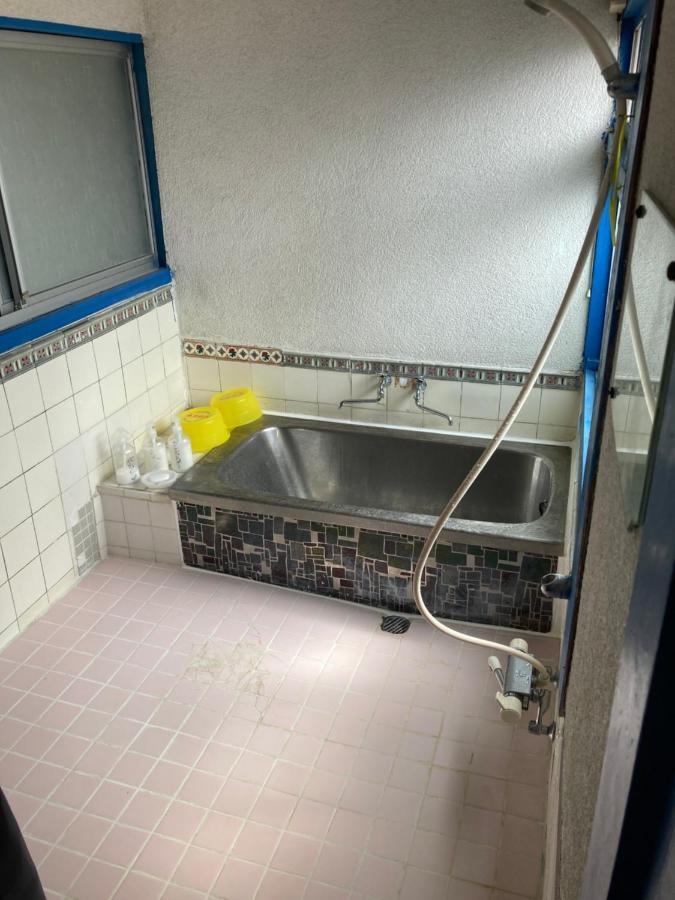 素泊まり民宿とみや Oshima Extérieur photo